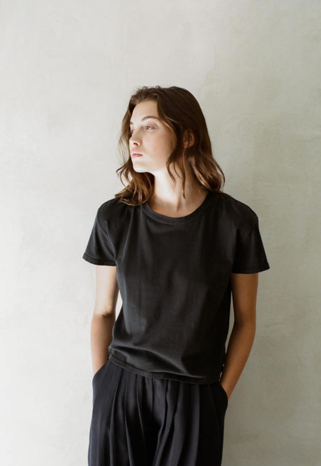 A comfortable, black-colored tee made from 100% organic cotton.