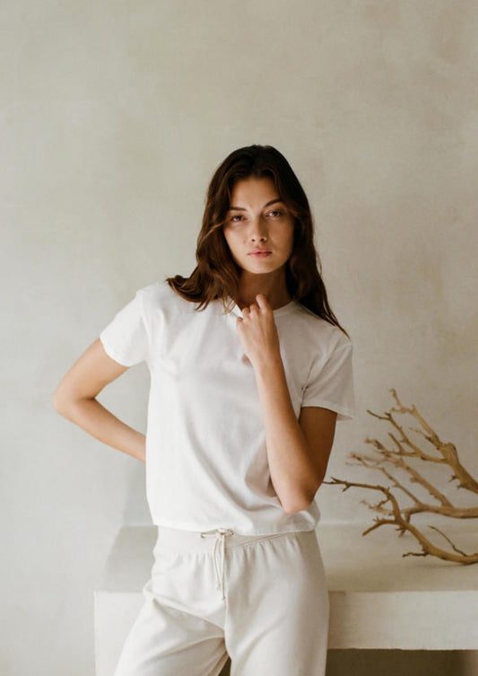 A comfortable, white-colored tee made from 100% organic cotton.