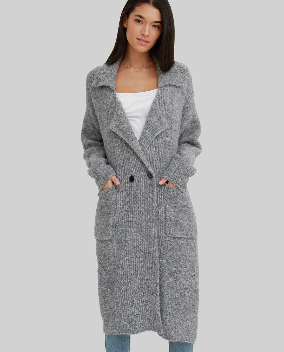 Cozy full-length coat, complete with convenient front pockets