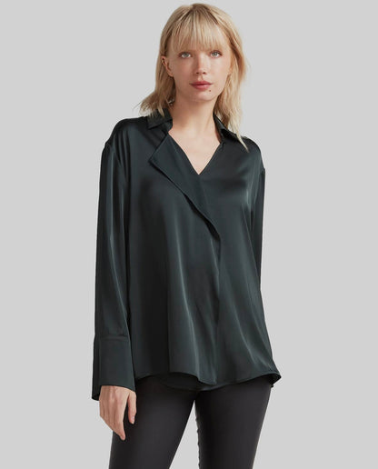 A relaxed-fit black shirt featuring a waterfall ruffle at the front, long sleeves, and made from 100% recycled polyester.