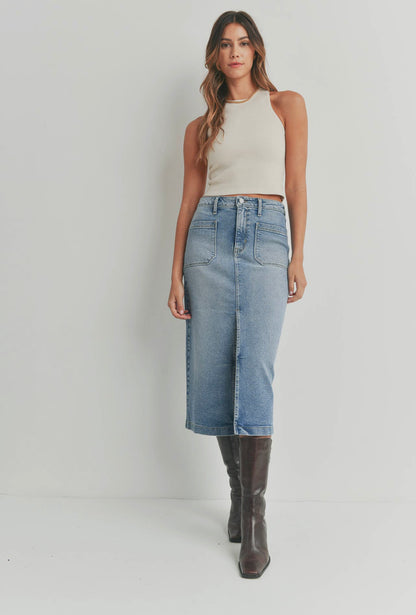 A midi jean skirt with front and back pockets, featuring a front slit detail for added style and movement.