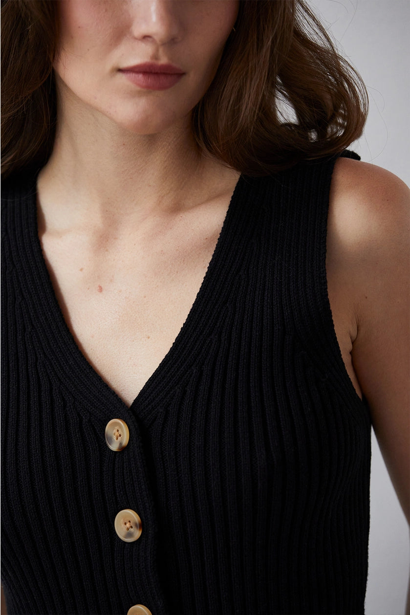 V-neckline and front button closure